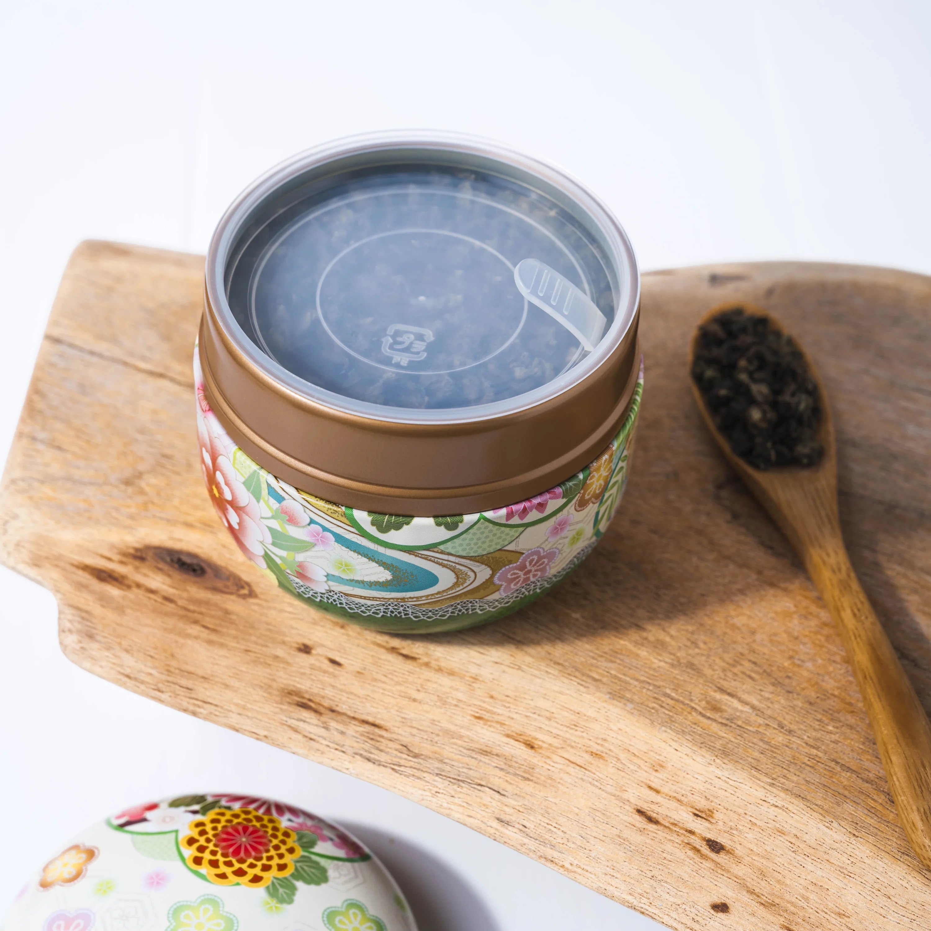 Round Metal Tea Tin - White & Green Floral - Image 5